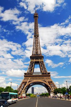 Eiffel tower on background of blue sky in Paris, France