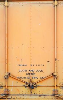 Yellow Orange old railroad car door and latch