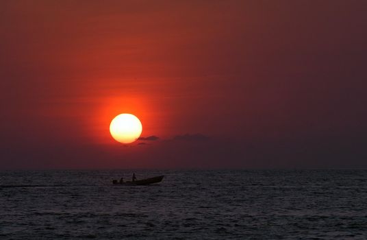 Boat on sea during sunset, Puerto Escondido, Mexico