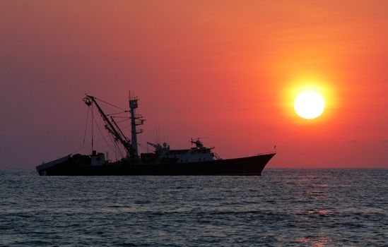 Boat on sea during sunset, Puerto Escondido, Mexico