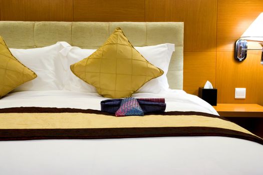 Image of a comfortable looking hotel bed.