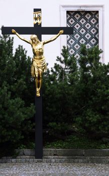 Crucifix in front of the church in Vranov near Brno, Czech republic