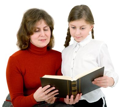 Woman and girl reads a brown cover book