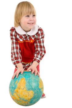 Little girl and terrestrial globe on the white