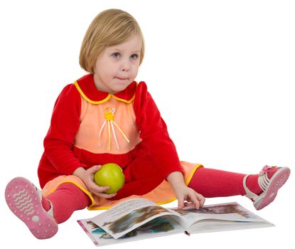 Little girl looking the book on white