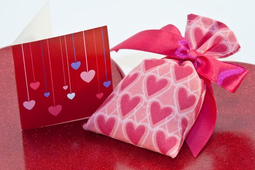 Red metallic heart dish with heart sachet with card
