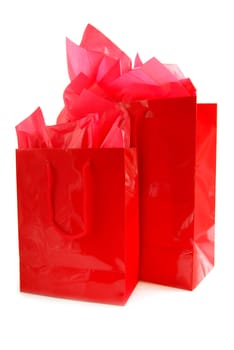 Two red shopping bags isolated on white background