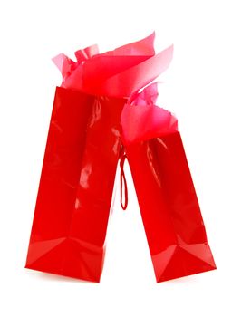 Two red shopping bags isolated on white background