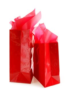 Two red shopping bags isolated on white background