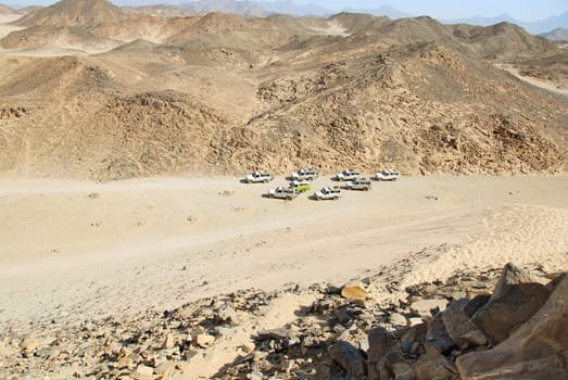 safari jeeps at Sahara dry desert by Hurghada, Egypt