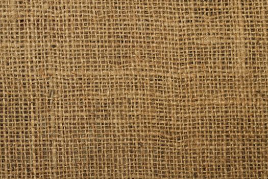 background texture of an ancient brown jute material
