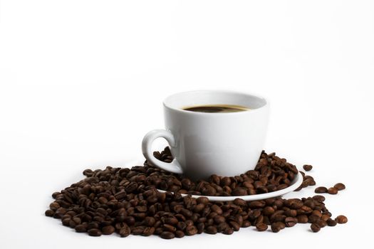 coffee cup with coffee and beans on white background