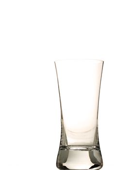 one empty glass on white background