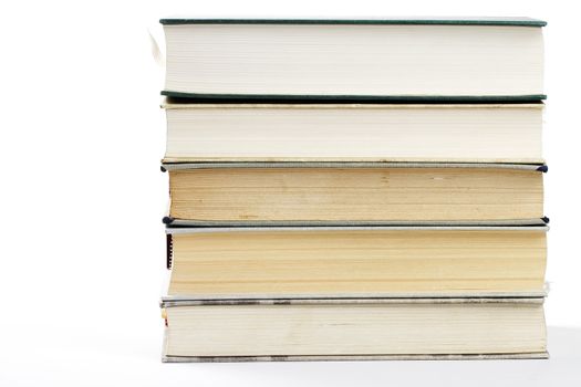 a stack of five books on white background