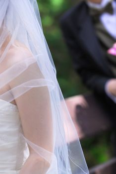 Bride and groom on their wedding day outside
