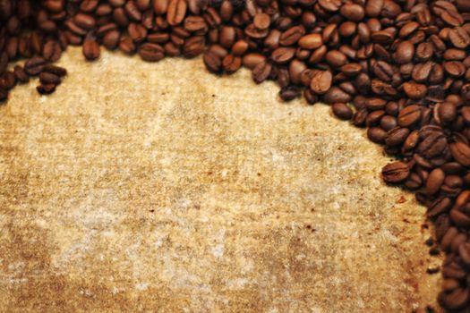 A photo based illustration of grunge coffee bean background with room for your text.