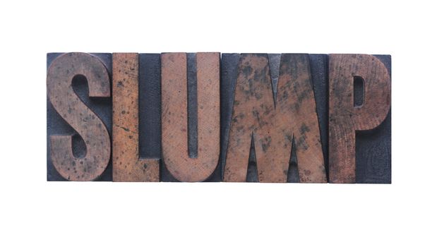 the word 'slump' in old ink-stained wood type