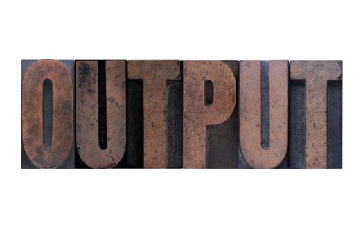 the word 'output' in old ink-stained wood type 