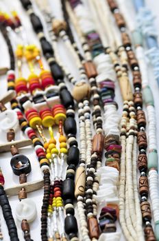 Wood and seashell bead necklaces close up