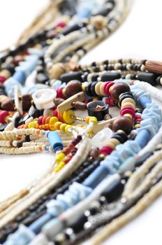 Wood and seashell bead necklaces close up