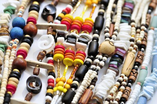 Wood and seashell bead necklaces close up