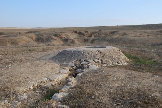 Kind of the ancient well in dry desert