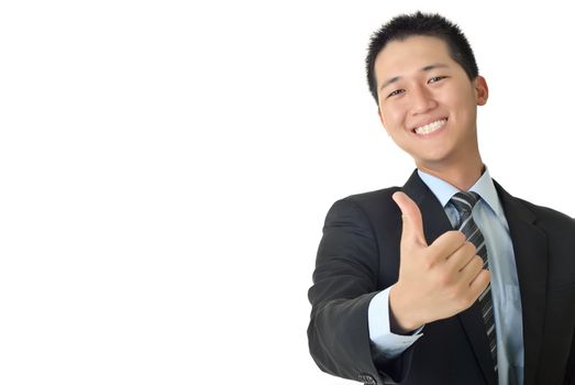 Smiling young businessman give you a excellent sin with copyspace on white.