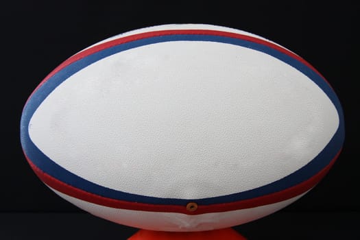 rugby ball on a tee