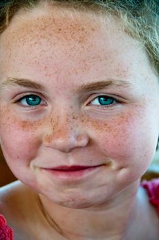 head shot of girl with freckles