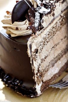 Slice of chocolate mousse cake served on a plate