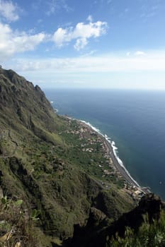 Sky photo of a city by the sea in Madeira