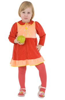 Little girl holding green apple on hand