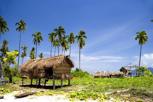 Image of a native hut on a tropical island in Malaysia.
