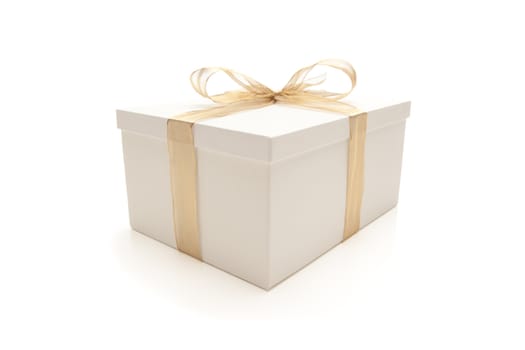White Gift Box with Gold Ribbon and Bow Isolated on a White Background.