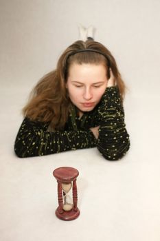 Young beautifful gril from Poland with watch in isolated photo. Home Photo Studio Sony Alpha 700