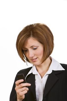 Young businesswoman checking her mobile phone.