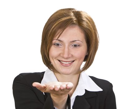 Smiling brunette offering something on her hand.Selective focus on the face.