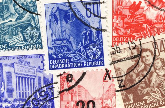 collage of old german stamps from german democratic republic