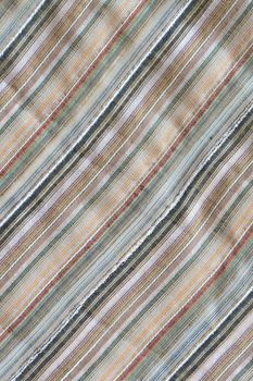 Background made from nice striped multi colored cotton fabric