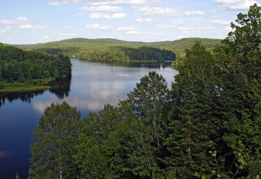 A beautiful mountain range with a fresh water lake.