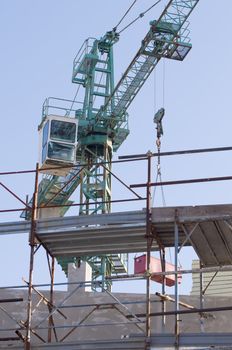 Crane and scaffolding in a contruction site