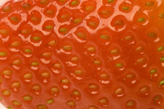 Isolated macro image of a strawberry.