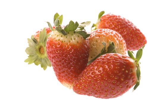 Isolated macro image of strawberries.