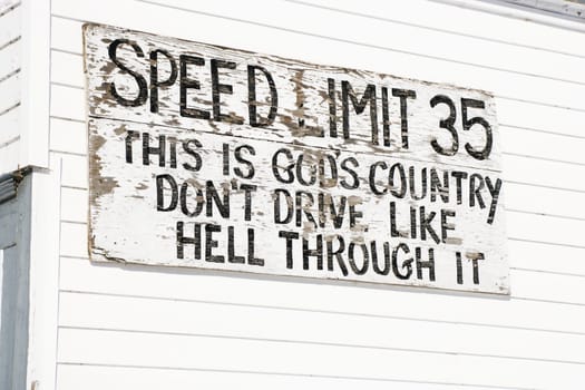Funny small town speed limit sign.