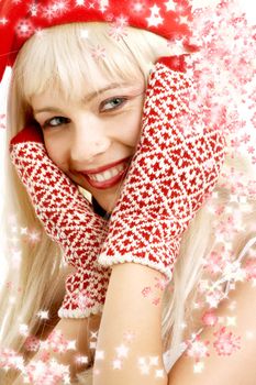 pretty girl in christmas hat with rendered snowflakes