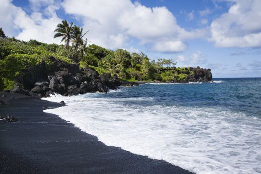 Black sand beach in Maui, Hawaii.