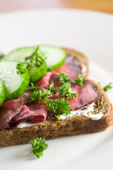 Delicious healthy sandwich on brown with roastbeef and cucumber