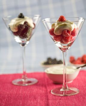Sweet and delicious dessert with fruit and whipped cream