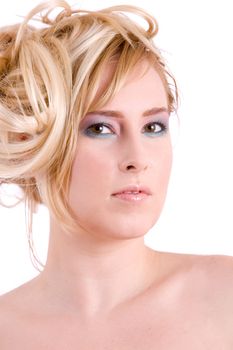 Beautiful blond woman with stylish hair and makeup