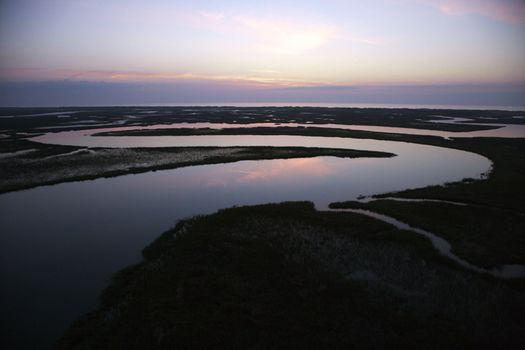 Tidal creek meandering through wetlands of Bald Head Island, North Carolina.